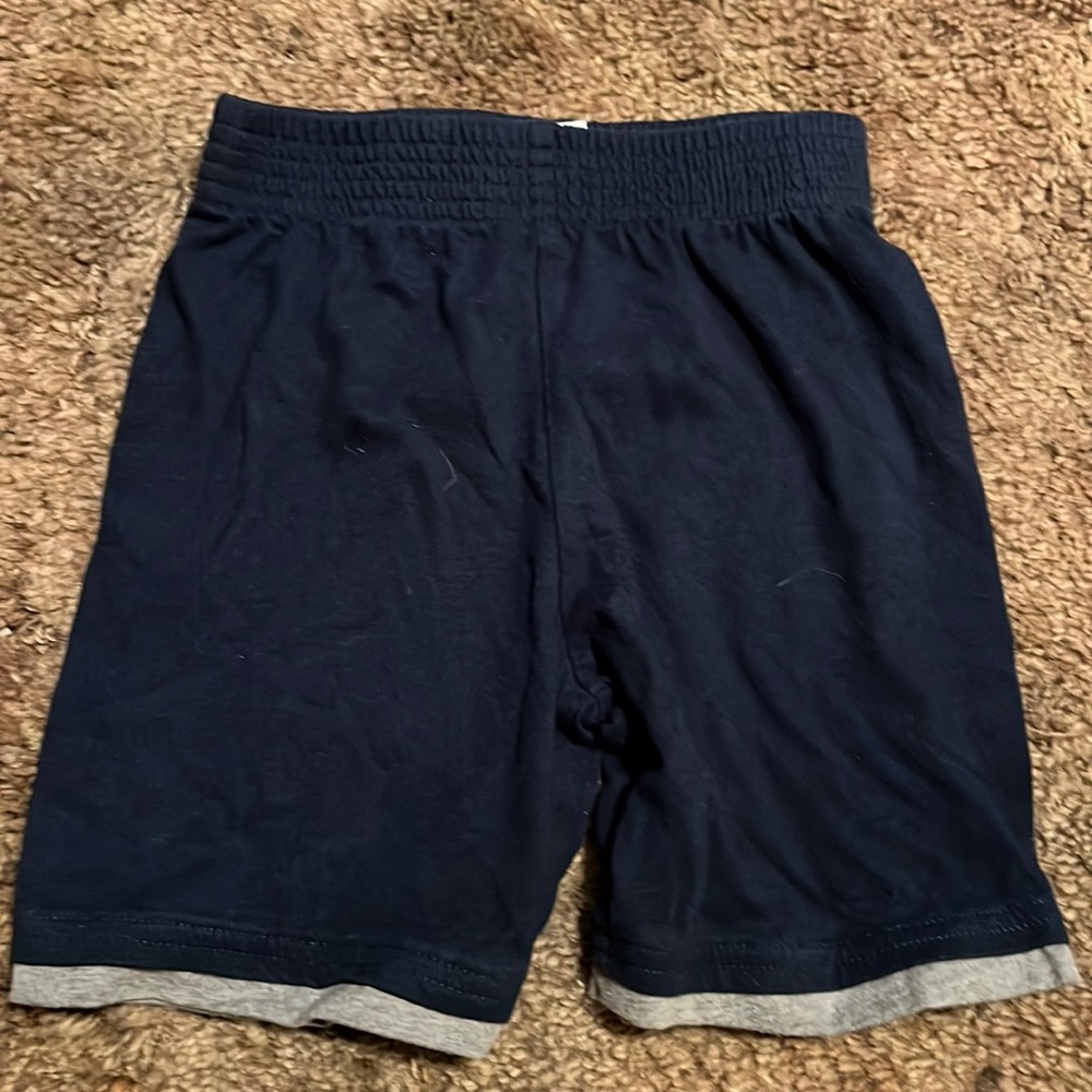 Blue shorts.